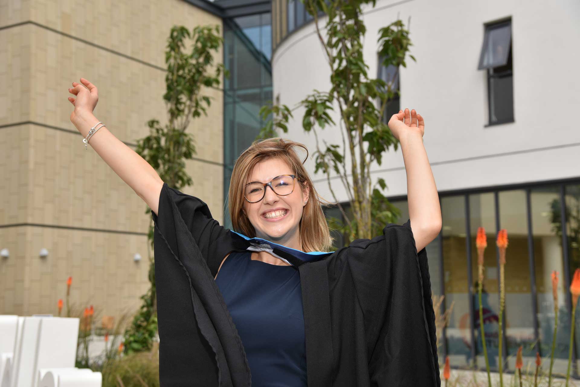 graduate on her graduation day celebrating